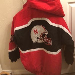 Official Nebraska hooded football coat..worn 2-3 times. Boys 14-16
